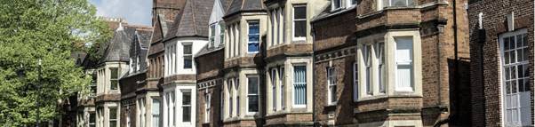 A large brick building

Description automatically generated