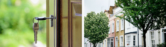 Keys in a door and a row of houses. 