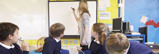 A group of people in a classroom

Description automatically generated with low confidence