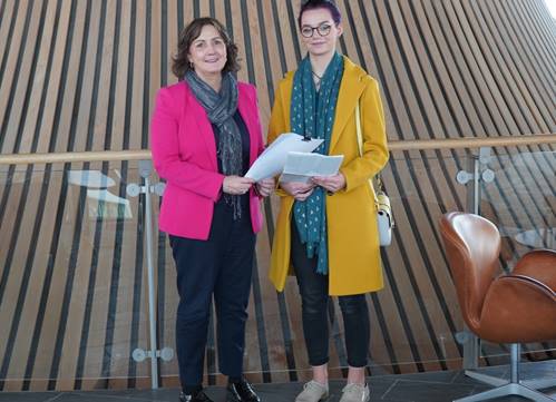 A group of people posing for the camera
Description automatically generated