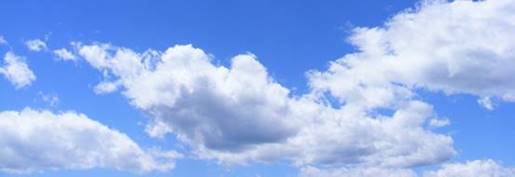 A group of clouds in the sky

Description automatically generated