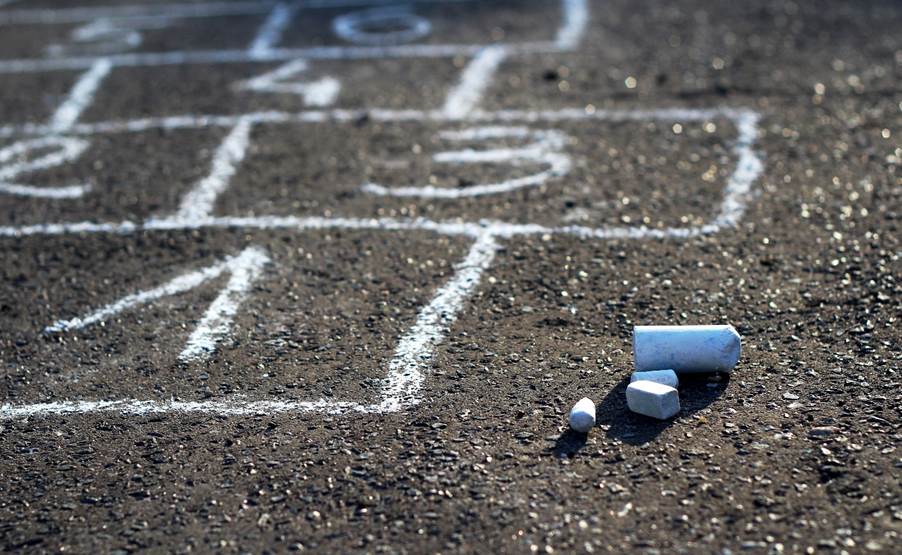 Chalk on the ground with a hopscotch

AI-generated content may be incorrect.