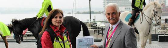 Petitioners handing the petition over to the Committee